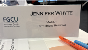 ennifer Whyte's name placard at the FGCU Southwest Florida Leadership Institute — Owner, Fort Myers Brewing